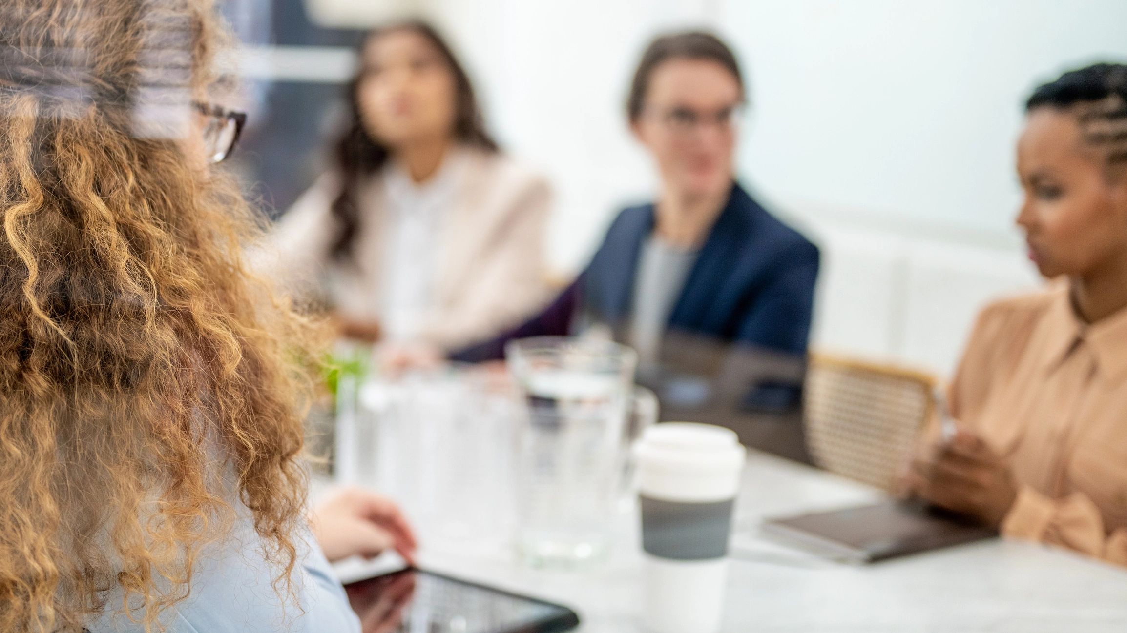 Consultants reviewing governance and compliance documents