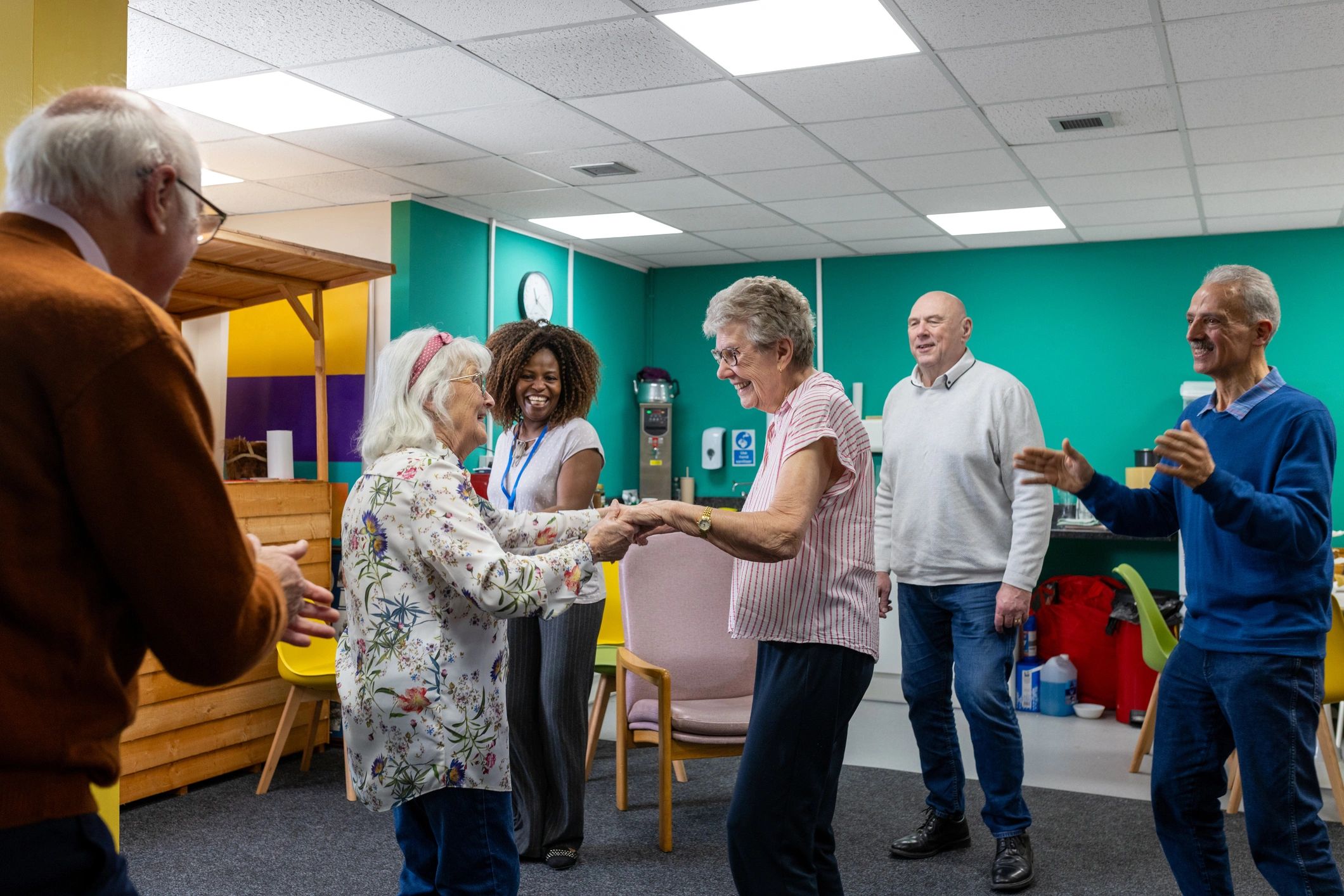 Aged care staff and seniors in a supported community setting